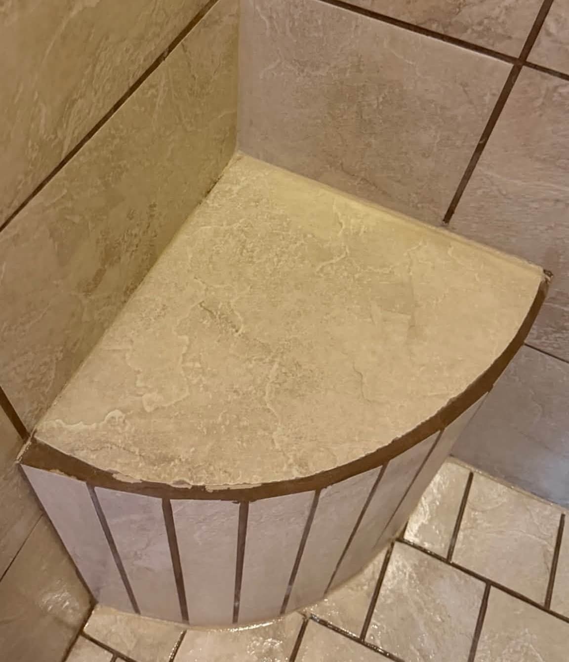 The same tiled shower bench, clean, after a deep cleaning by Kat's Cleaning Services